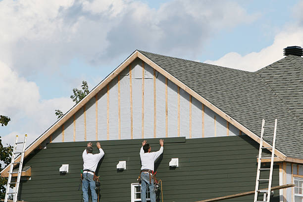 Professional Siding Contractor technician working in Montgomery, WV